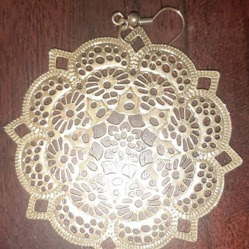 Large boho earrings used, gold color