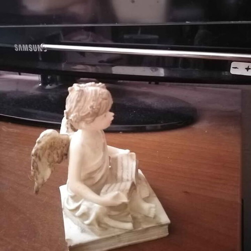 Angel figurine beige color like new