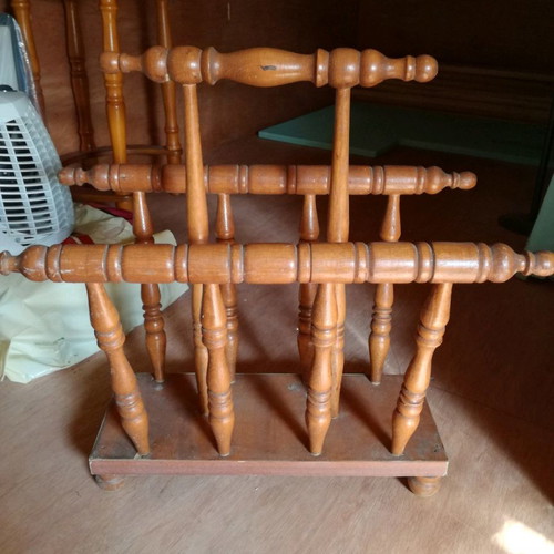 Wooden magazine rack used, carved design