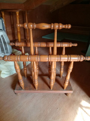Wooden magazine rack used, carved design