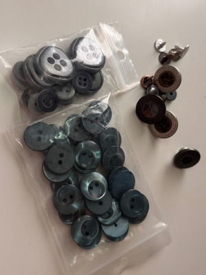 Various green and metal buttons like new
