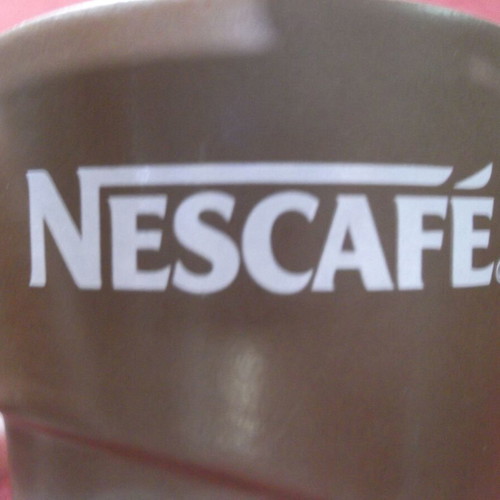 Nescafe collectible ceramic cup and saucer set like new