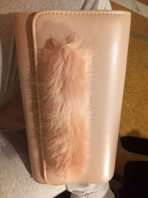 Pink clutch used with chain and slight wear