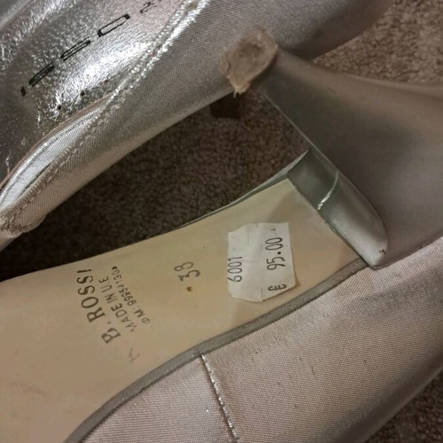 B. Rossi silver pumps size 38 used with low heel