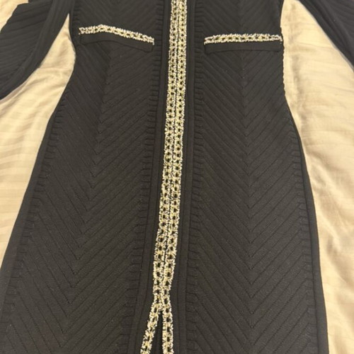 Zini dress new with beautiful details and front slit