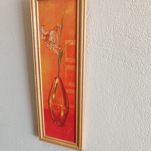 Decorative framed canvas print used, flower in glass vase