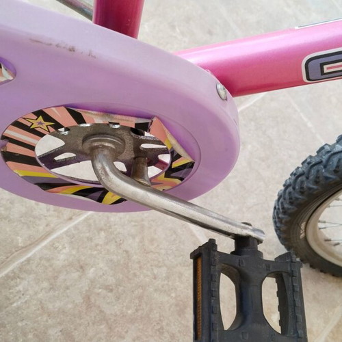 Girls BMX bike used with training wheels