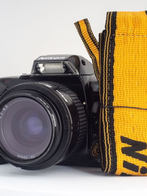 Nikon F-401X 35mm film camera with original leather strap