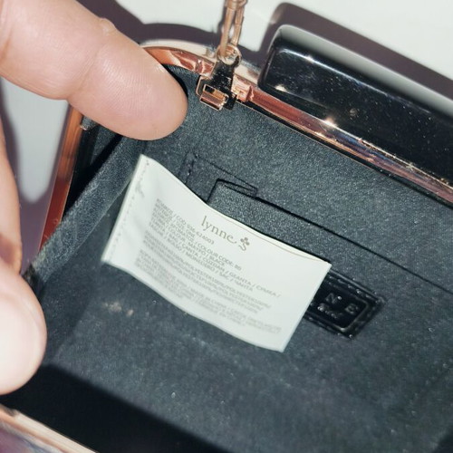Lynne black embossed fabric handbag
