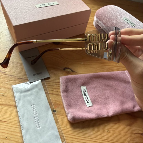 Miu Miu sunglasses, grey and gold