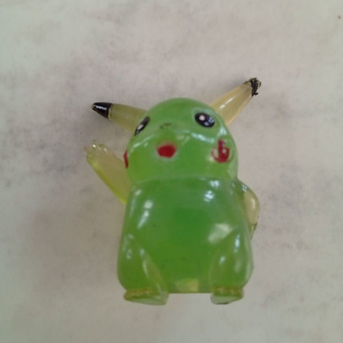 Vintage Pikachu figure miniature, clear green bootleg
