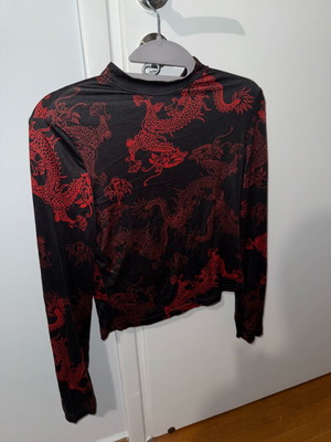 Shein long-sleeve blouse like new with black and red designs size M