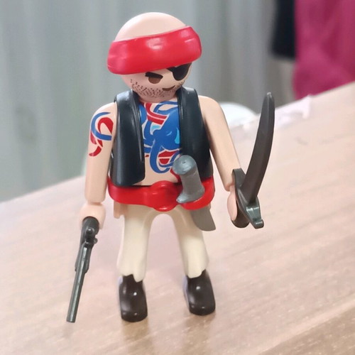 Playmobil Bald Pirate like new with weapon and sword