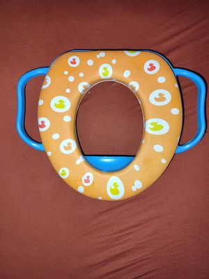 Παιδικό κάθισμα τουαλέτας μεταχειρισμένο με μαλακό μαξιλαράκι και παπάκια