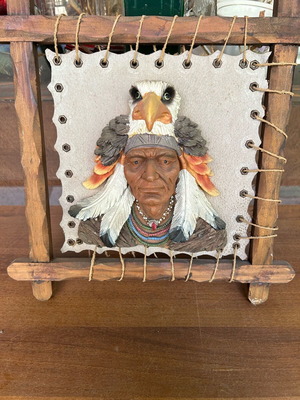 Indian sculpture on frame