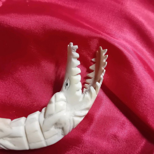 Crocodile made of camel bone used, in very good condition