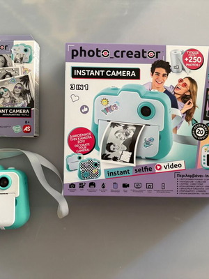Photo Creator Instant Camera with 10 Rolls like new
