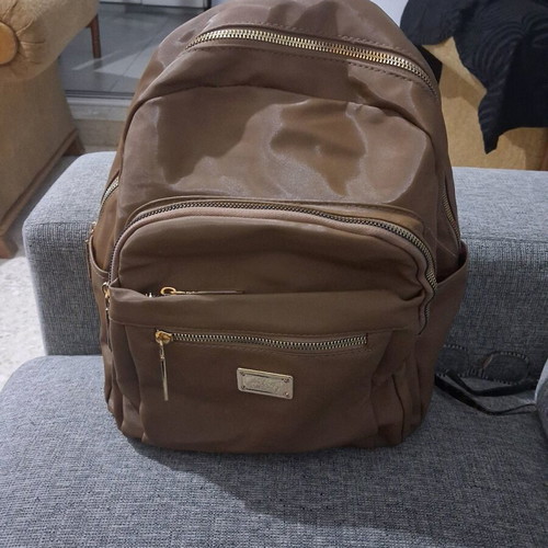 Backpack like new brown with gold zippers