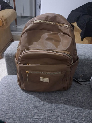 Backpack like new brown with gold zippers