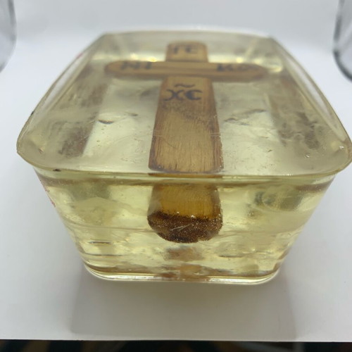 Silver cross with eye and wooden cross in liquid glass new