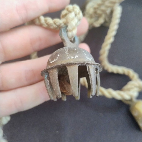 Vintage brass bells tied on rope used