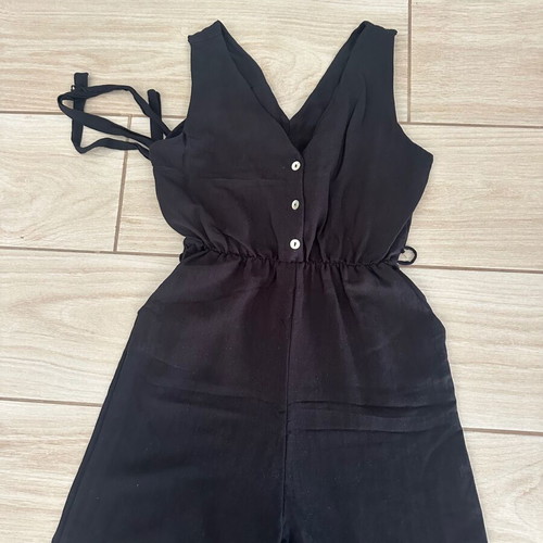 Black sleeveless jumpsuit with belt and pockets, M
