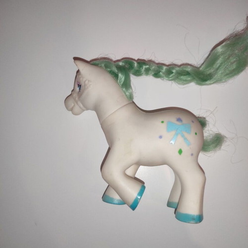 Gi-Go Tootsie Pose pony used with bridle and painted hooves