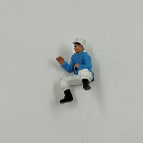Vintage plastic soldier figure used, seated pose