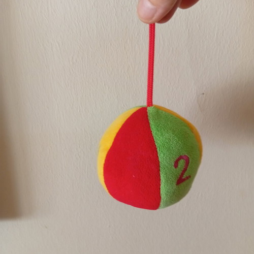 Hanging fabric ball toy