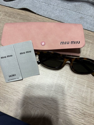 Miu Miu Sunglasses like new, black and brown