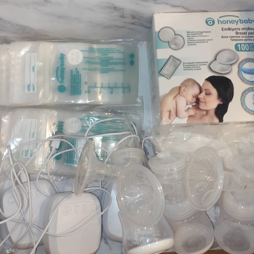 Breastfeeding set with pumps and accessories like new
