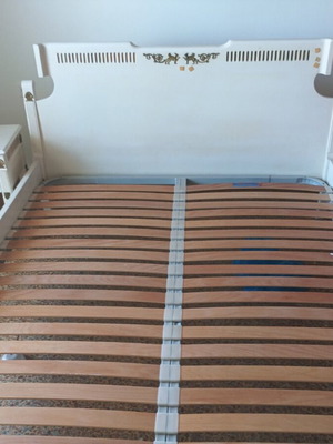 Bed with 2 nightstands used