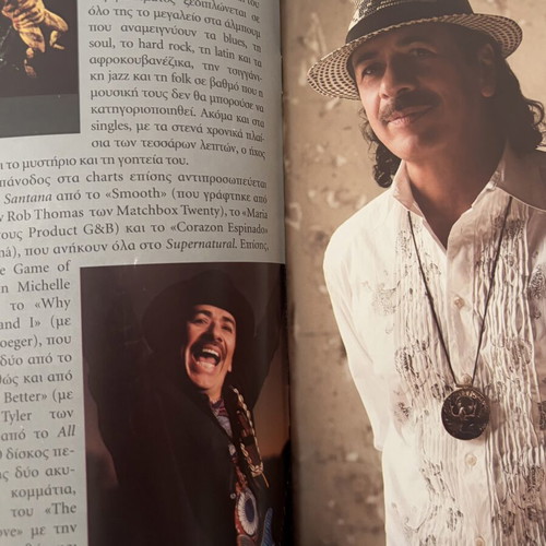 Santana book with 2 CDs like new