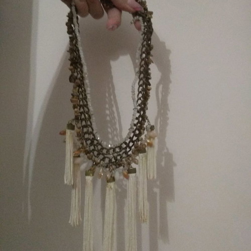 Women's necklace with tassels and beads used