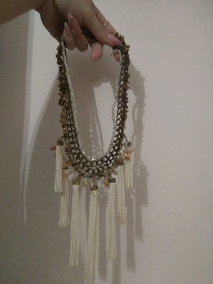 Women's necklace with tassels and beads used