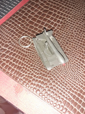 Transport vehicle keychain with rocket new, green