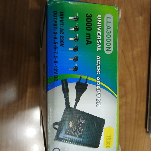 Universal AC/DC adapter new, adjustable power supply with multiple plugs