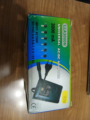 Universal AC/DC adapter new, adjustable power supply with multiple plugs