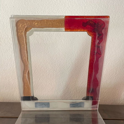 Glass photo frame colored with plexiglass used