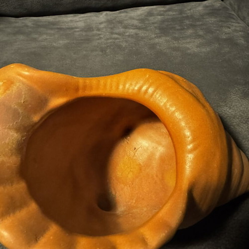 Clay flowerpot in shell shape like new