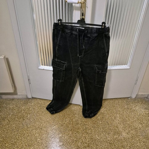 Black pants used with white details, size L