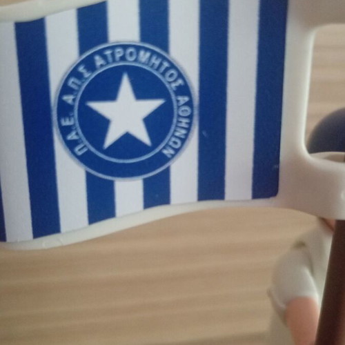 Playmobil Atromitos football fan figure with flag and cap