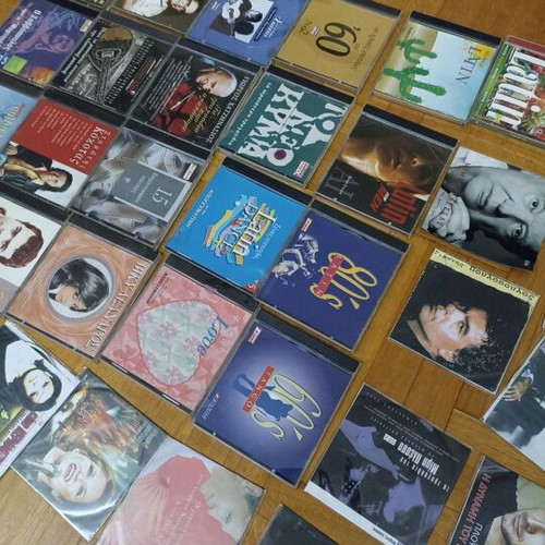 43 assorted DVDs with songs and movies
