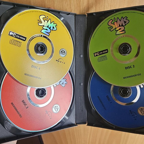 The Sims 2 PC game used, simulation