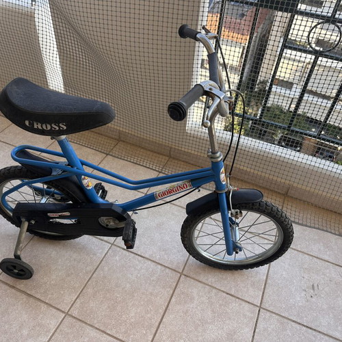 Vintage children's bike used, blue with training wheels for ages 5-7