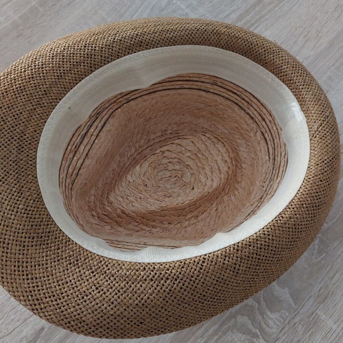 Straw hat like new with black strap, one size