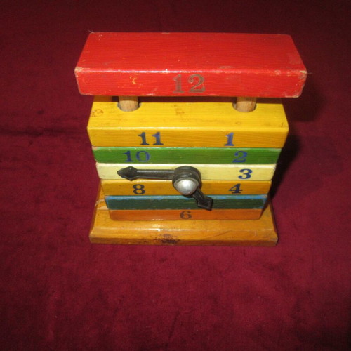 Wooden toy clock coil used 70s