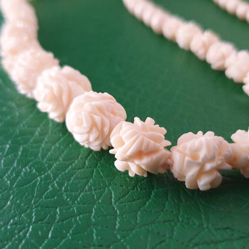 Vintage carved bone necklace with rose details
