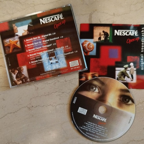 Pack of 4 used CDs: Nescafe, Party, Xmas, Christmas music