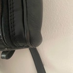 Black leather backpack used
